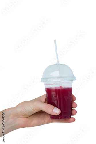 Hand holding healthy juice
