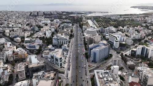 Aerial drone video of landmark buildings in Syggrou Avenue urban cityscape, Athens centre, Attica, Greece photo