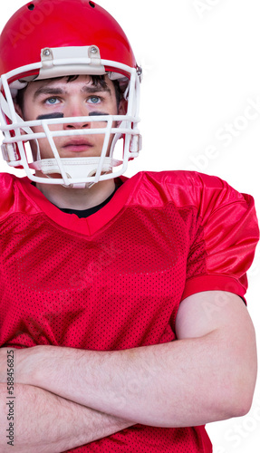 American football player with arms crossed