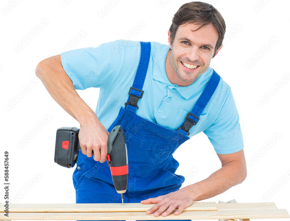 Carpenter using drill machine on wood Carpenter using drill machine on wood
