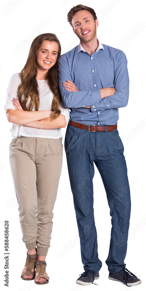 Smiling young couple with arms crossed