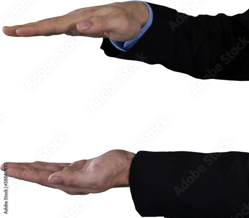 Cropped image of businessman holding invisible product