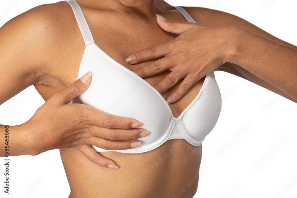 Woman standing for breast cancer awareness in white bra against white background