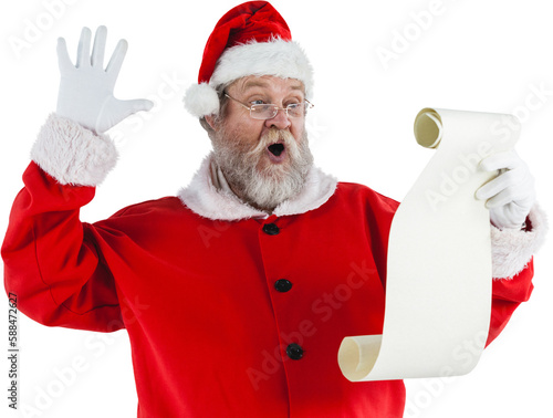 Surprised Santa Claus making face while reading scroll