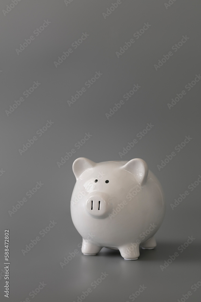 Piggy bank on grey background. Financial concept. Bank depression concept. Piggy bank on grey background. Financial concept. Bank depression concept.
