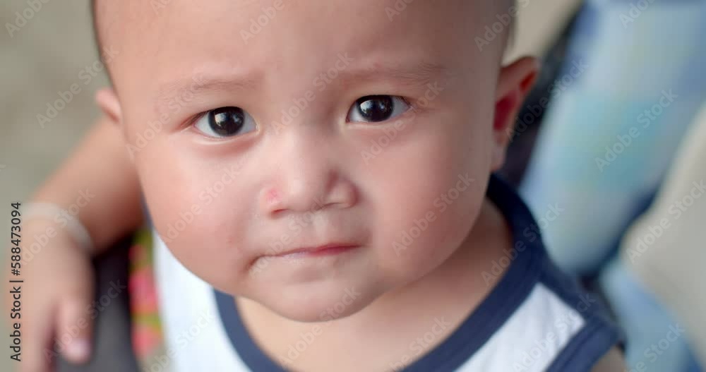 Beautiful Smiling Baby on chair.Baby smile at camera with nice soft focus background.Boy smiles. Beautiful Smiling Baby on chair.Baby smile at camera with nice soft focus background.Boy smiles.