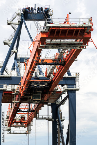 Shipping container gantry crane in an industrial port. photo