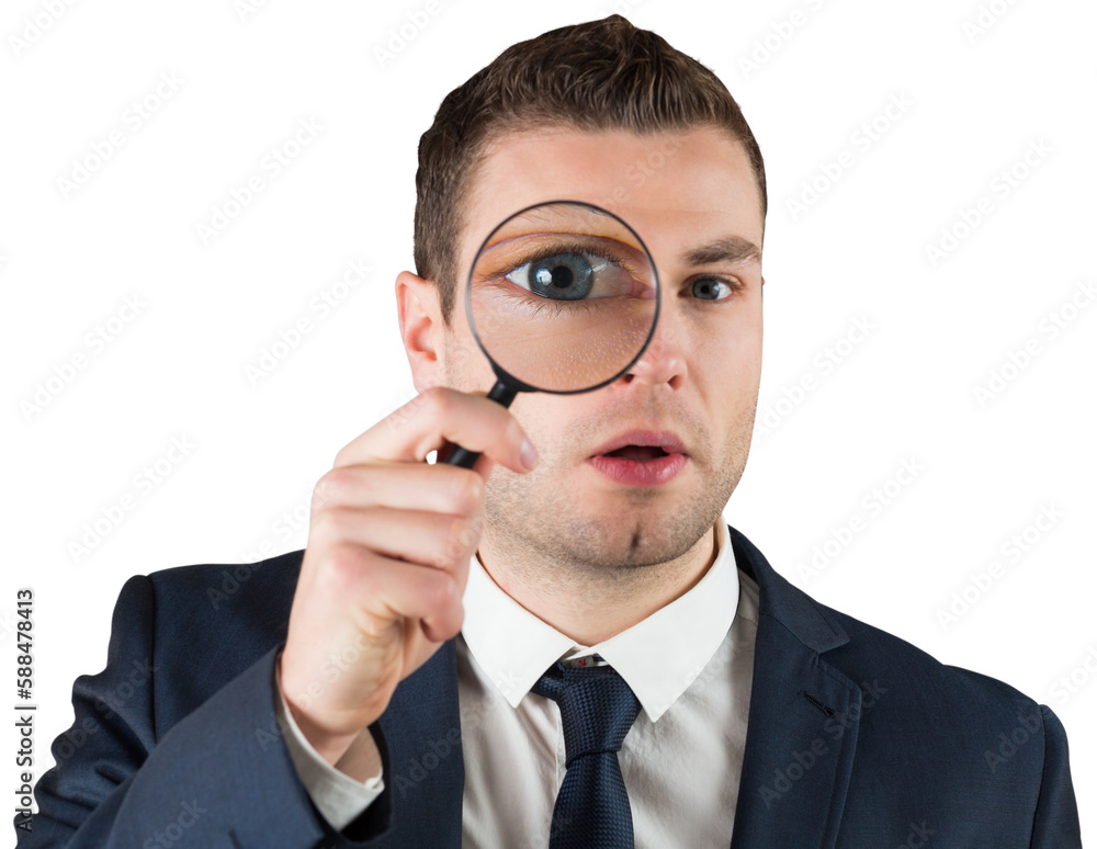 Businessman looking through magnifying glass Businessman looking through magnifying glass