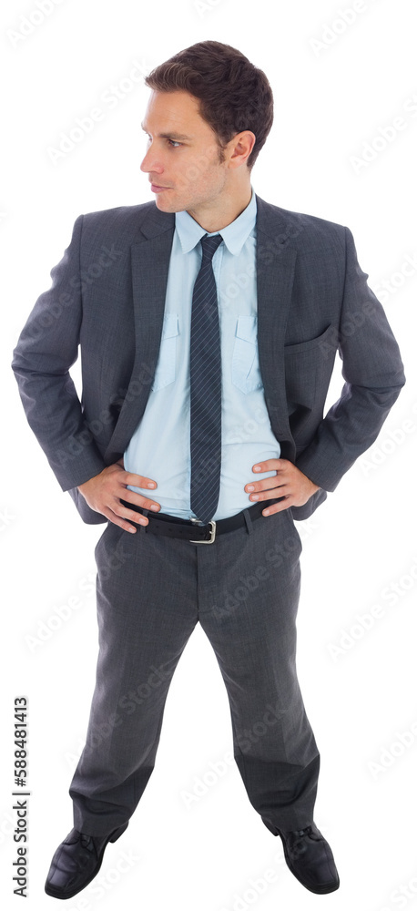 Stern businessman standing with hands on hips Stern businessman standing with hands on hips