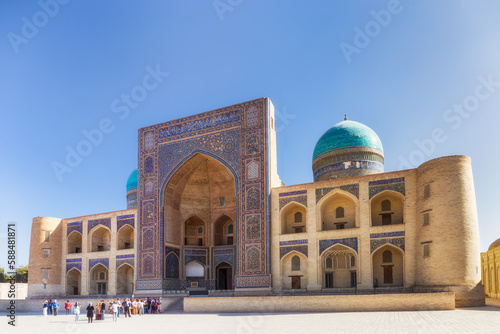 Bukhara. Uzbekistan. October 13, 2019 : Mir i Arab madrasa of Po i Kalan Poi Kalan - islamic religious complex. UNESCO heritage site photo
