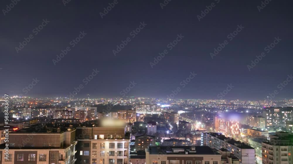 Timelapse. Beautiful night city of Bishkek with buildings and cars a Timelapse. Beautiful night city of Bishkek with buildings and cars a