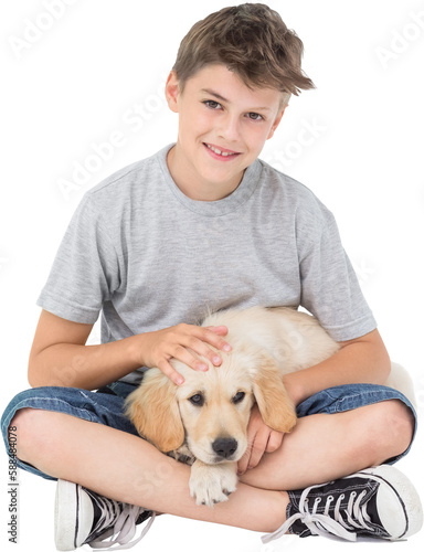 Boy sitting with dog 