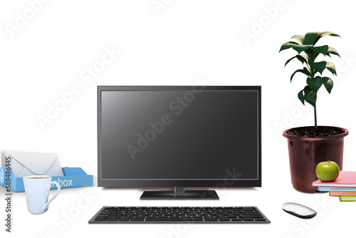 Computer by potted plant