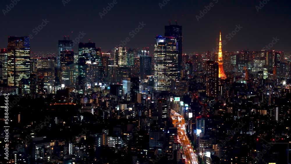 TOKYO - OCT 3rd, 2022: Aerial view of Tokyo Tower from Shibuya, Tokyo, Japan at night TOKYO - OCT 3rd, 2022: Aerial view of Tokyo Tower from Shibuya, Tokyo, Japan at night