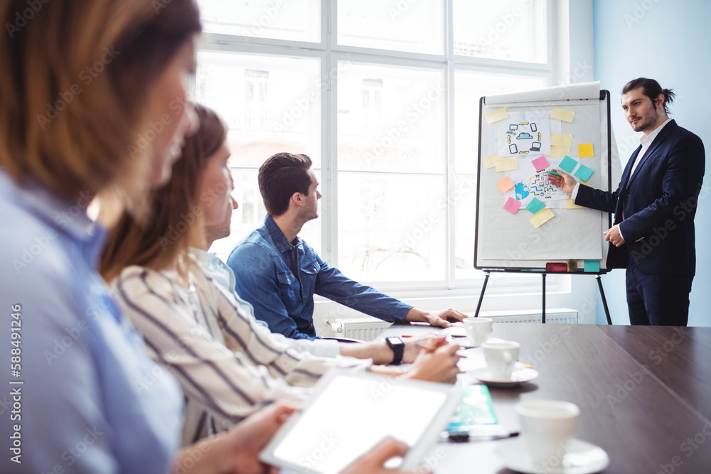 Fototapeta premium Businessman giving presentation