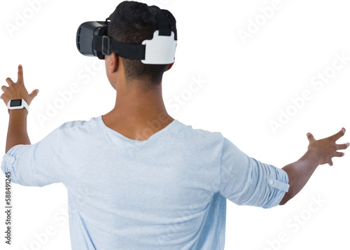 Rear view of man using virtual reality headset