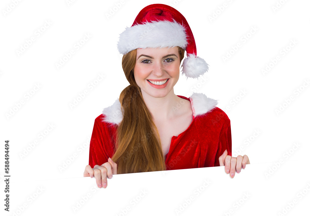 Pretty girl in santa costume showing card Pretty girl in santa costume showing card