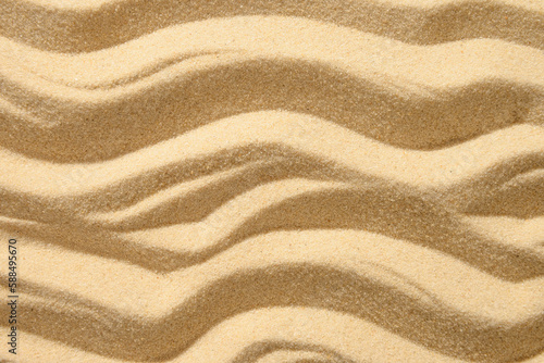 Sandy beach background. Top view. Copy space. Backdrop for mockups. Summer vacation.