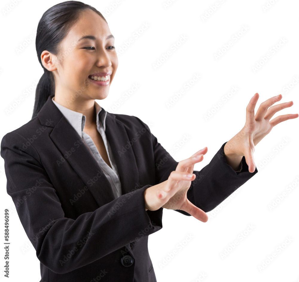 Smiling businesswoman touching the invisible screen Smiling businesswoman touching the invisible screen