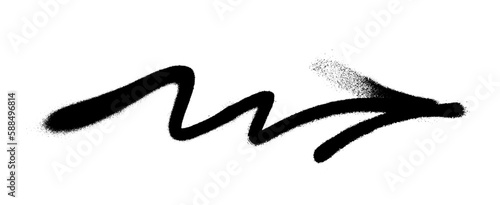 Graffiti arrow with overspray in black over white.