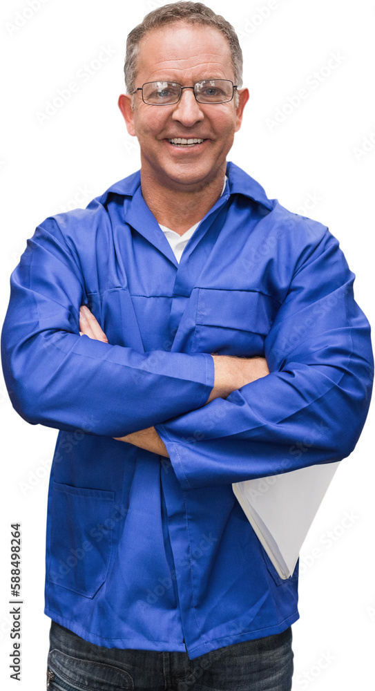 Smiling warehouse manager standing with arms crossed Smiling warehouse manager standing with arms crossed