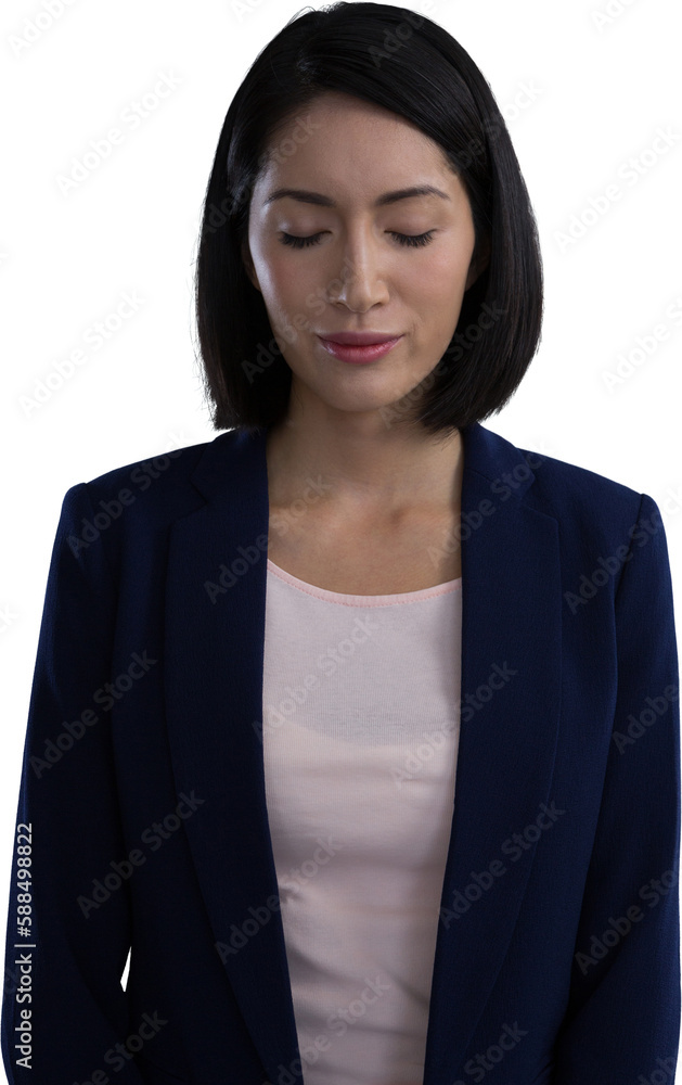 Businesswoman standing with her eyes closed Businesswoman standing with her eyes closed
