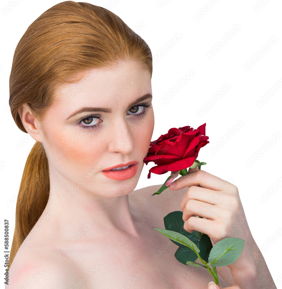 Fototapeta premium Beautiful redhead posing with red rose