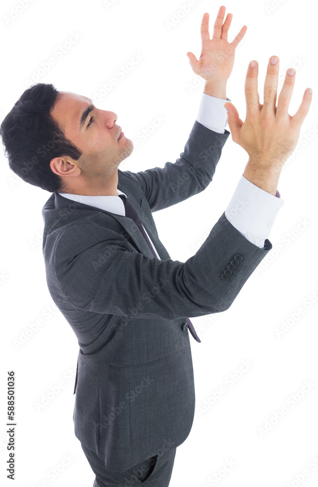 Unsmiling businessman with arms raised Unsmiling businessman with arms raised