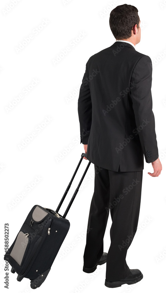Businessman pulling his suitcase Businessman pulling his suitcase