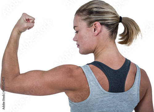 Rear view of muscular woman flexing muscles 