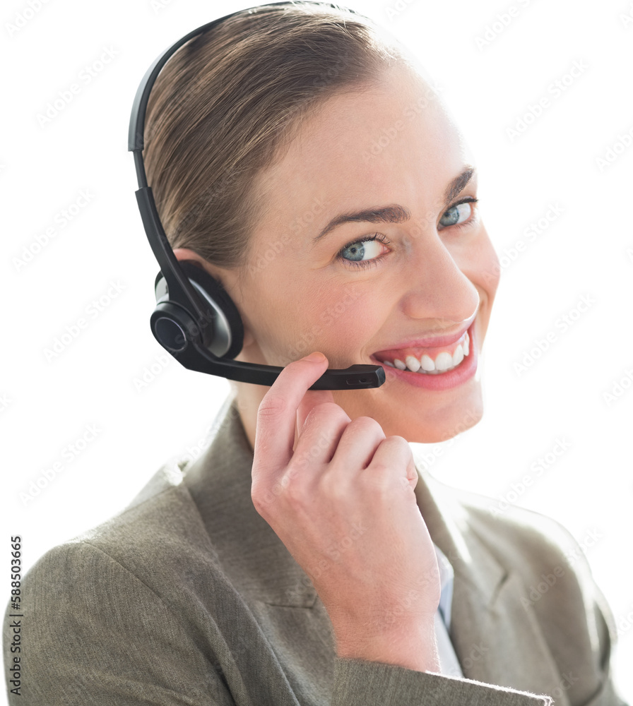Smiling businesswoman with headset using computers Smiling businesswoman with headset using computers