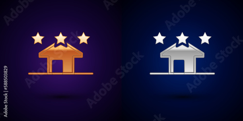 Gold and silver House icon isolated on black background. Real estate agency or cottage town elite class. Vector