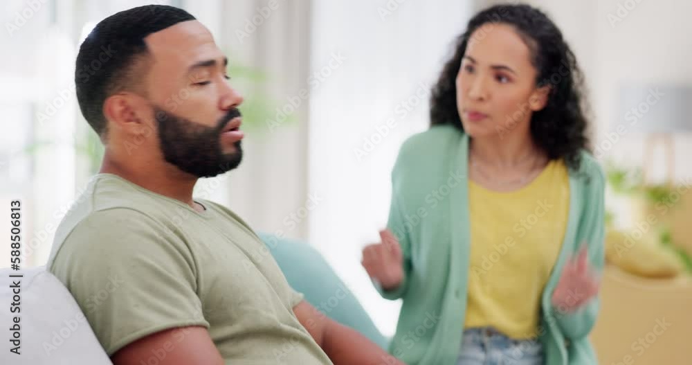 Couple, argument and home on living room sofa with stress, conflict and woman shouting at partner. Man, girl and fight with frustrated face for marriage, cheating or mistake on lounge couch in house Couple, argument and home on living room sofa with stress, conflict and woman shouting at partner. Man, girl and fight with frustrated face for marriage, cheating or mistake on lounge couch in house