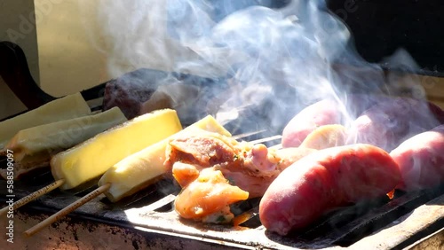 Close-up video of Latin American churrasco grilling. Savory sausage & curd cheese showcase rich flavors, culinary heritage in Brazil 