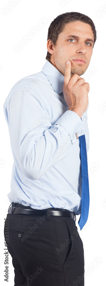 Thinking businessman touching his chin Thinking businessman touching his chin
