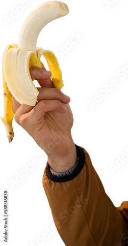 Close-up of hand holding peeled banana