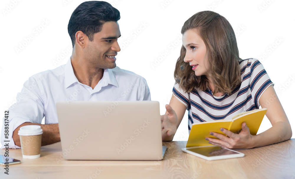 Business people discussing while sitting at table Business people discussing while sitting at table