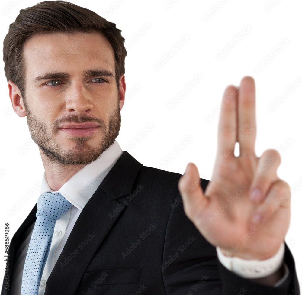 Confident businessman touching invisible interface Confident businessman touching invisible interface