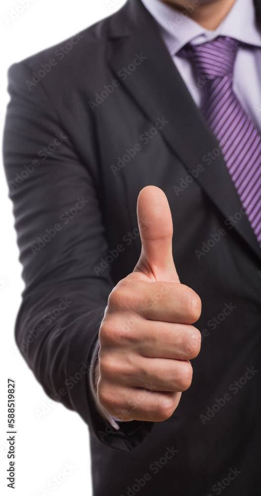 Midsection of businessman gesturing thumbs up Midsection of businessman gesturing thumbs up