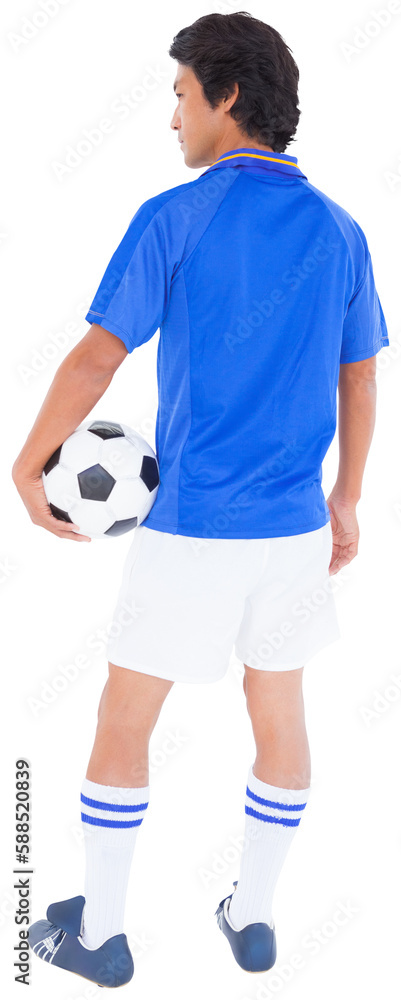 Rear view of player holding football