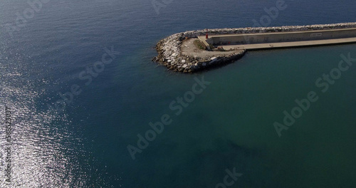 High angle view of sea with pedestrian walkway