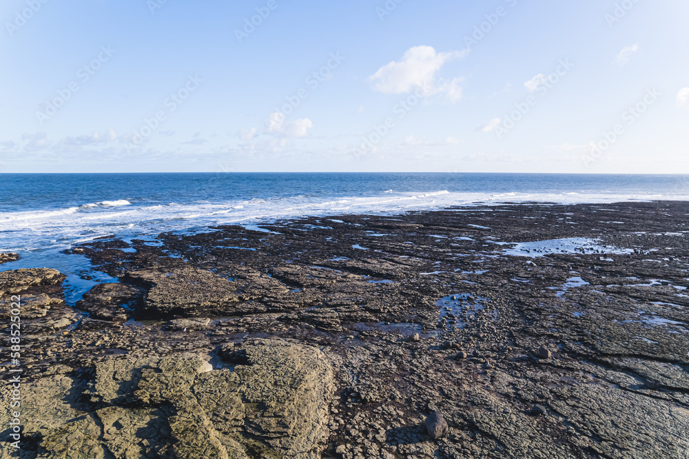 Flamborough Head beach. North Landing beach - beautiful expanse of sand, white pebbles and rock pools. High quality photo Flamborough Head beach. North Landing beach - beautiful expanse of sand, white pebbles and rock pools. High quality photo