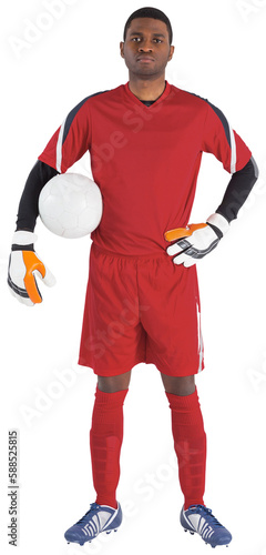 Goalkeeper in red holding the ball