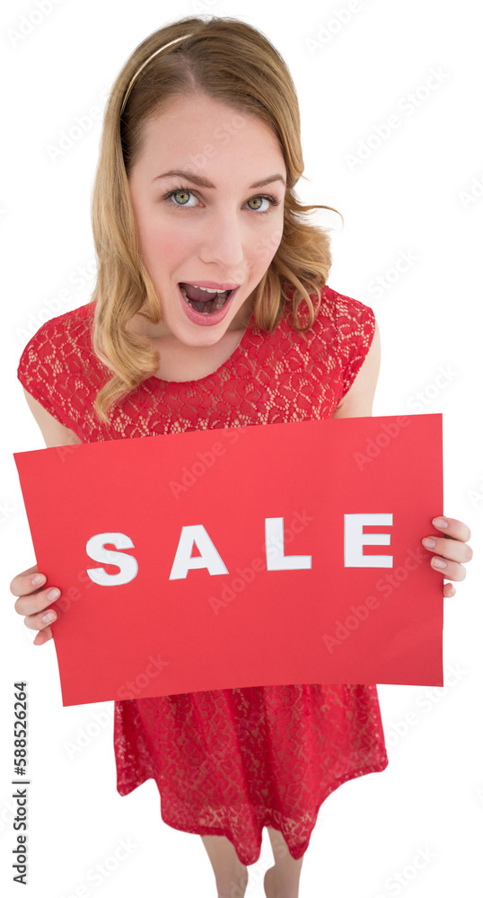 Surprised blonde showing a red sale poster Surprised blonde showing a red sale poster