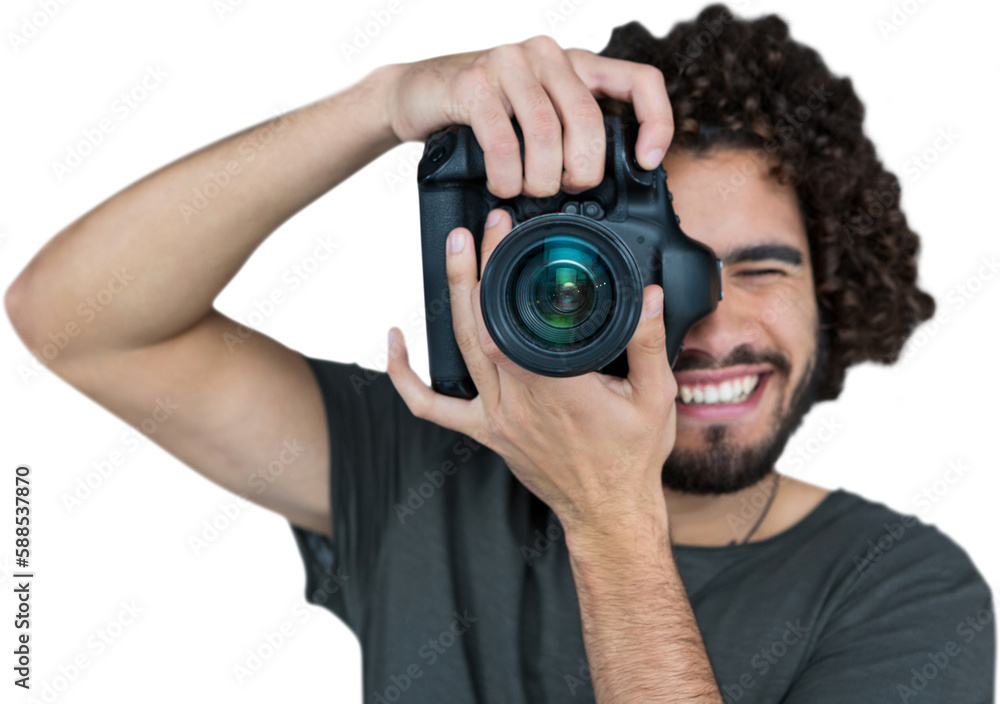Smiling male photographer taking picture Smiling male photographer taking picture