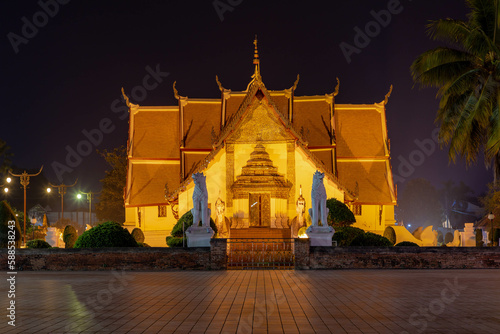 Wat Phumin at night and light, The famous Buddhist temple is renowned for its cruciform ubosot which was constructed in 1596 and restored during the reign of Chao Ananta Bora Riddhi Det, Nan, Thailand photo
