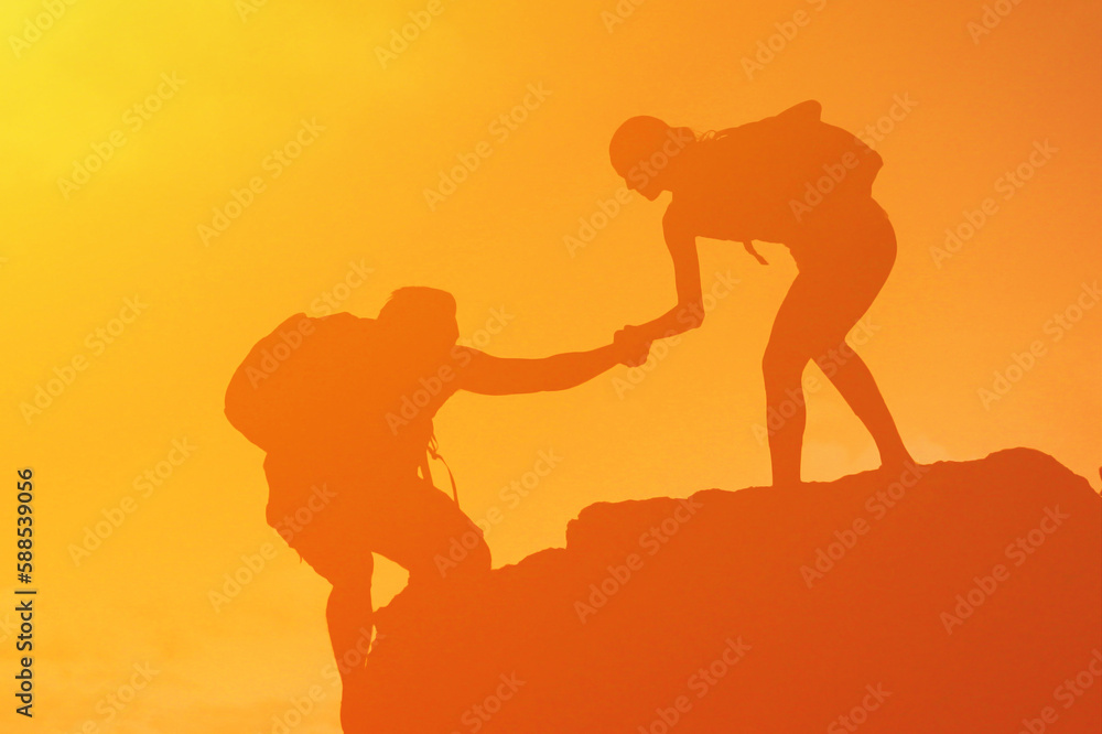 Hiker giving help assistance to a friend 