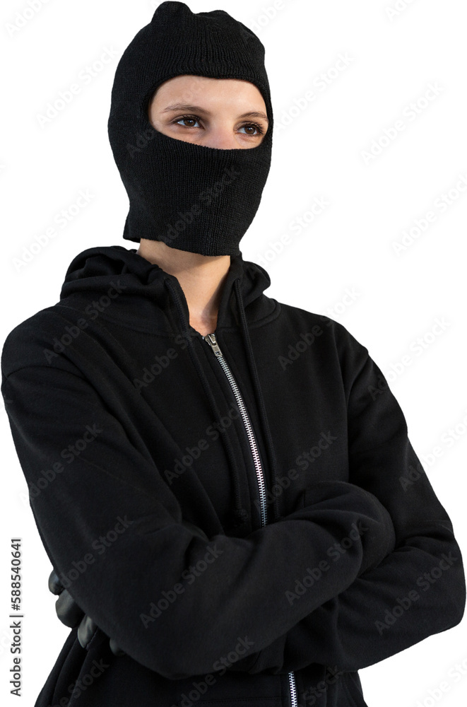 Thoughtful female hacker standing with arms crossed Thoughtful female hacker standing with arms crossed
