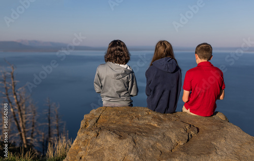 Family at Yellowstone Lake overlook, Wyoming 