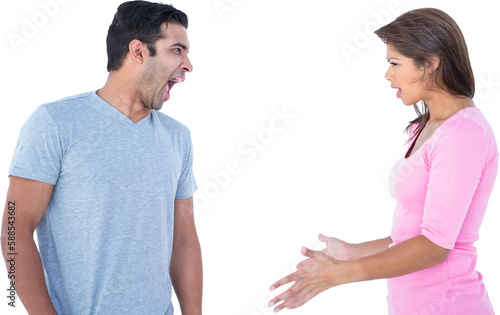 Side view of angry couple shouting during argument